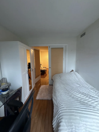 Bedroom - Clean, one bedroom in 2 bedroom apartment for rent, furnished with bed, desk, and drawer.