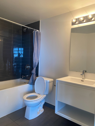Shared Bathroom - Private rooms in a co-living condo unit at Wellesley St. E, Toronto for Females only
