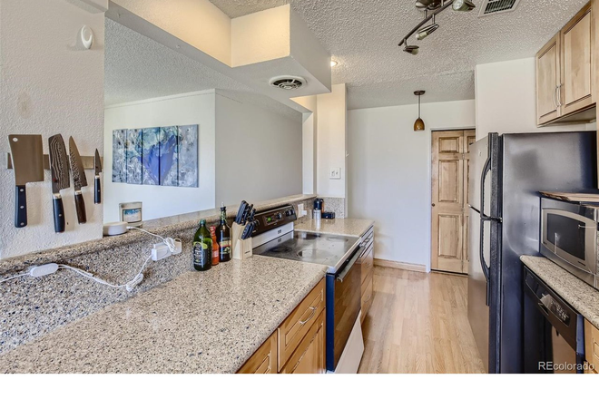 Sleek kitchen design has lots of counter space for prepping - LOCATION! $1500/month -  2BD/2BA Corner Condo across from CU. ONLY 1 BDR FOR RENT