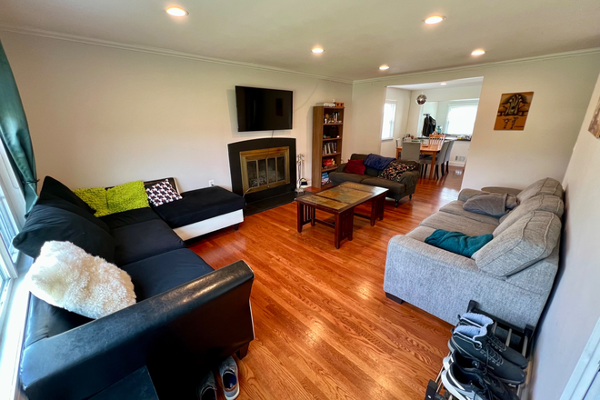 Furnished living room - Large Home in Quiet Neighborhood Close to Campus -- Large House of Grad Students