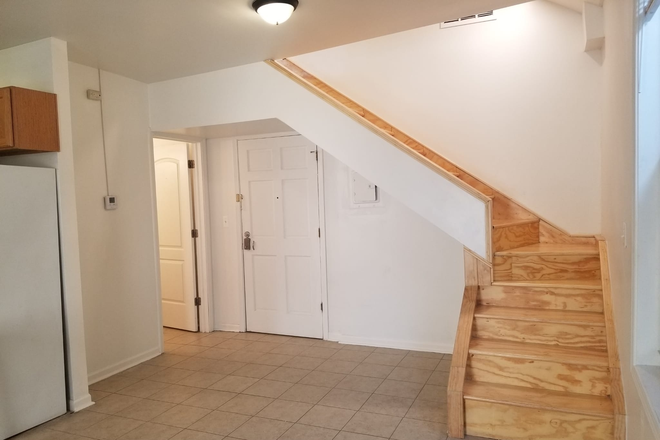 Living room. View of stairs to the bedrooms upstairs - 3 bdrm/1bath duplex for rent