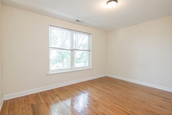 Living Room - Spacious 3 Bedroom - 2 Bathroom Apartment Steps from Campus