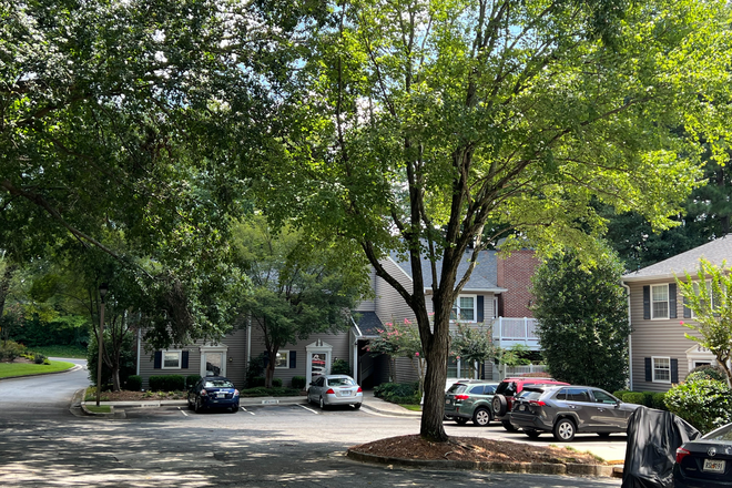 front of building and assigned parking - Spacious 2 bedroom condo in GREAT location!