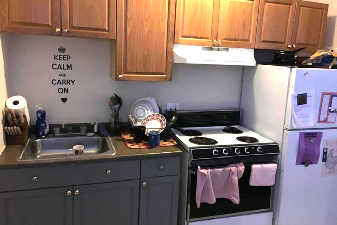 Visit hubrealtyproperties.com - Mission Hill, sunny front facing one bedroom on Green line T Apartments