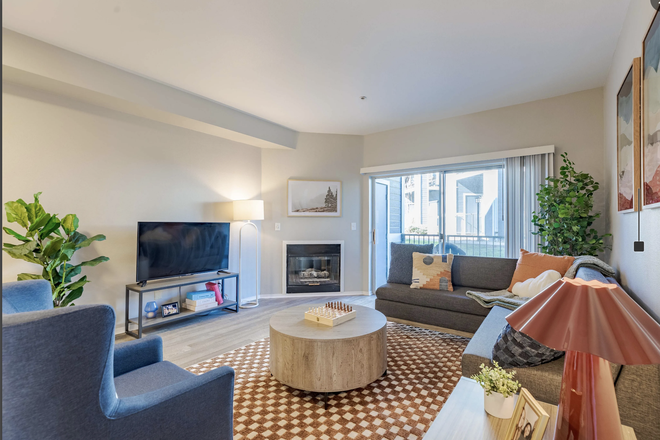 Living room  - stock photo from Union Baseline website - Furnished 2 BR 1 BR, across Baseline from campus Apartments