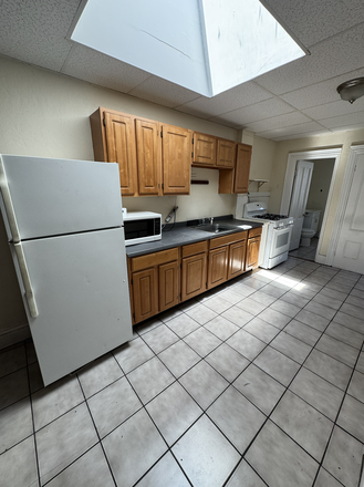 Call NOW for showings! 617-236-8600 - HARVARD ST - LRG & MODERN TOP FLR 2BR/1BA *AVAIL NOW* IN THE PORT W/ LNDRY ON SITE, EIK, OFFICE! Apartments