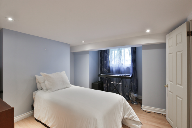 Bedroom - One bedroom furnished apartment in a century-old home in quiet neighbourhood