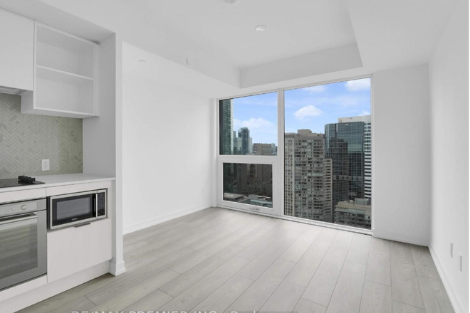 Living/bed area - Stunning Safest Studio Condo for Rent –Downtown Toronto Perfect for Young Professionals & Students