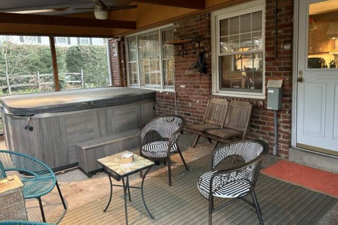 Back porch is awesome, great for chilling and watching the sunset. Hot-tub is fabulous too for more relaxation. - INCREDIBLE LOCATION! Top Floor of House with a Spacious One Bedroom, O