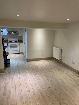 Living Room/ Dining Room - Spotless, clean 2 bedroom basement apartment - great neighbourhood - On subway route