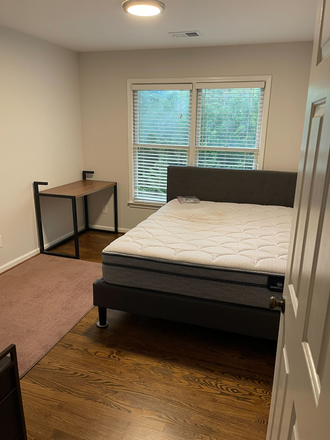 Bedroom with Queen bed and desk - 2 rooms with shared bathroom in a duplex available for rent in Fall 2026