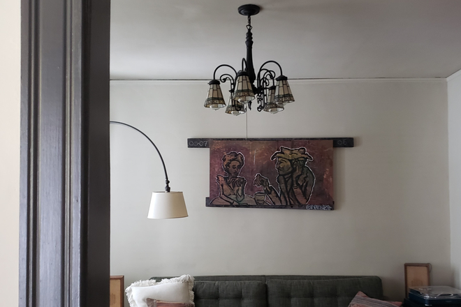 Entrance to living room from front hall - Charming 2-bedroom right on Tufts campus Apartments