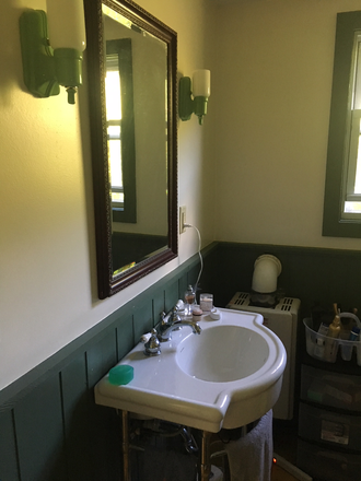 Bathroom has toilet, W/D, shower, sink, window and fan. - Maple Vale Farm Cottage Apartments