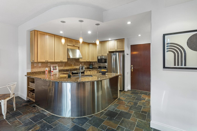 Kitchen - Garage Parking + W/D + Heated Kitchen Floors | Morning Sun | 1BD w/Private Patio Coming! Condo