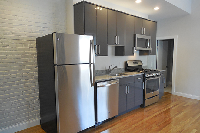 LIVING - 3 BED/1.5 BATH WITH HEAT AND HOT WATER INCLUDED! Apartments