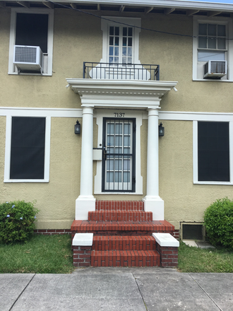 Entry - Bright Two-bedroom  Apartment with two balconies, large yard, parking