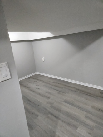 Beautiful renovated basement for rent in Brampton, furnished with a bed and drawers. - Basement in Lovely Home - Brampton