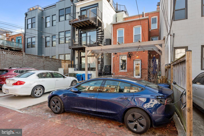 Rear yard, pergola and (upper house) parking - 2 BR Bright Apartment, Near Metro!