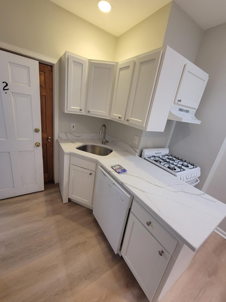Sink and kitchen counters - **NO BROKERS FEE!** cute and cozy 2 bed 1 bath unit heat hot water included Avail. 9/1/26! Apartments
