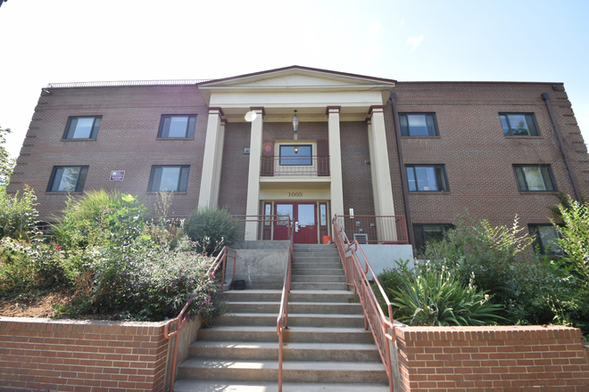 Front of Building - SPRING/SUMMER 2026; $1300/mo/bdrm; 1, 2 or 3 bdrms. Apt w/ fireplace on The Hill!!