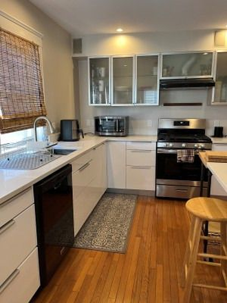 Kitchen - Bright & Spacious 2-Bedroom Apartment in Prime Location