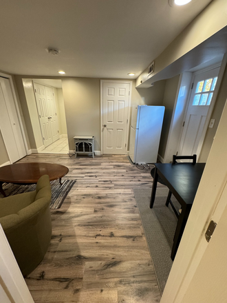 View of living area from bedroom. - Basement Apartment in East Riverdale