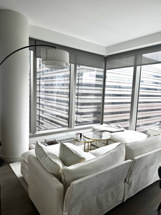 Living room - Bright Corner 1BR at Alcott Boston / West End / June 15th Apartments