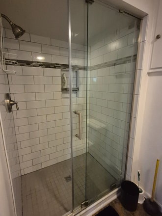 Bathroom shower - Basement apartment with kitchen, private bath, and private entrance