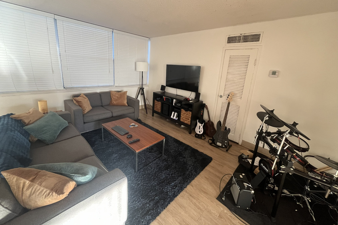 Living Room - Townhouse-Style Apartment for Rent - great value for a great location!
