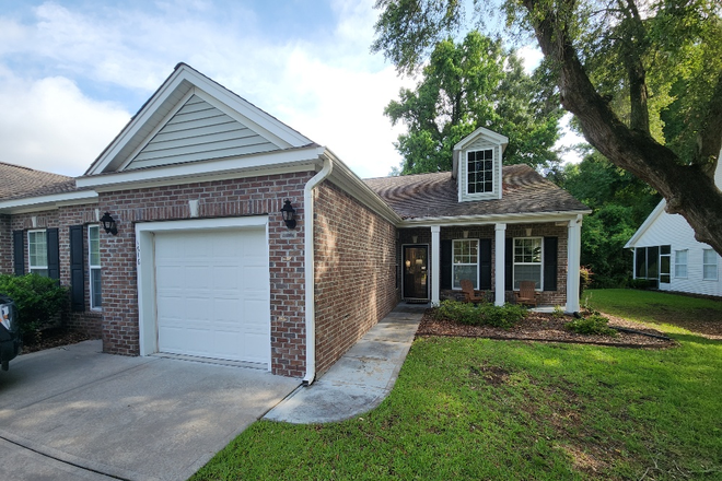 Front entrance w/2 outside parking spots plus garage. - Fenwick Commons: 2 BR, 2 Bath one story townhouse w/appx. 1638 sq. ft and a single car garage