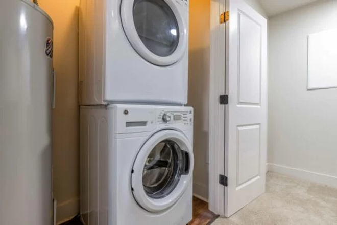 Laundry Room - 1 Bedroom available 4 bdrm/4 1/2 bthrm at the Retreat.  Small backyard.  Parking. Close to Cam