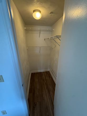 Closet - Collegiate Suites Apartments