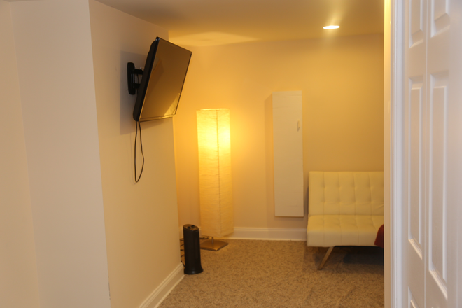 Entertainment Room in Basement - Beautiful Cottage close to Hospital Townhome