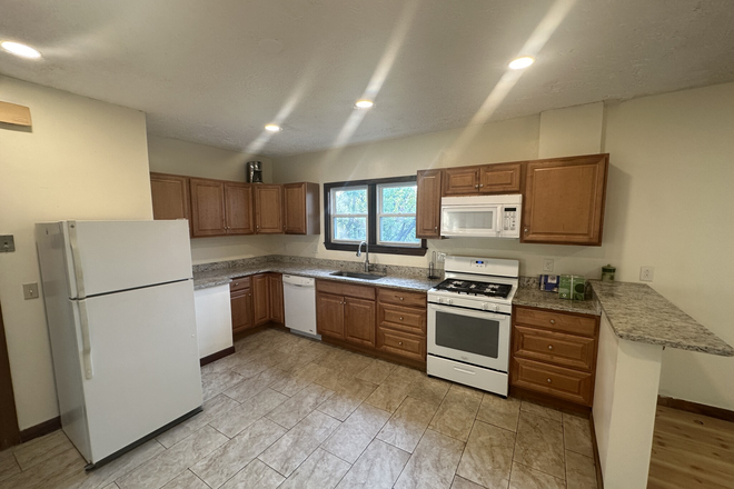 Kitchen - Large 4 bedroom + bonus room apartment! Includes Parking!