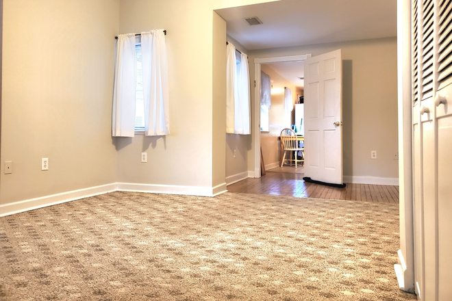 bedroom door - Private Suite - All Utilities Included Apartments