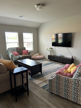 Living room includes smart-TV with streaming capabilities. - Private Room in Shared 4BR/2BA Home — All Utilities Included