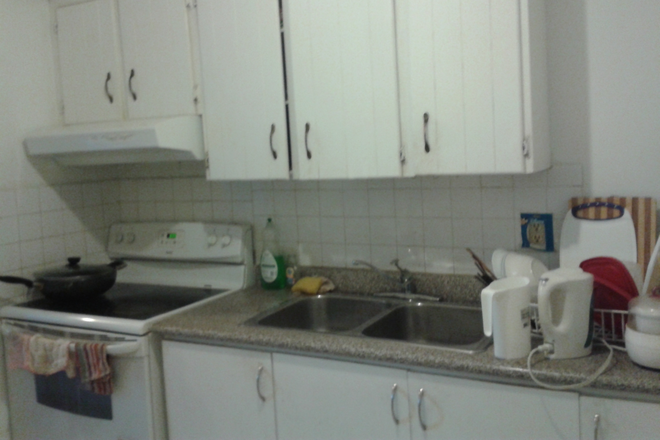 Kitchen - Room in 5BR/2BA/2level condo. Bus to UTM in ~10 min, 5 min walk to Mall, FreshCo, restaurants