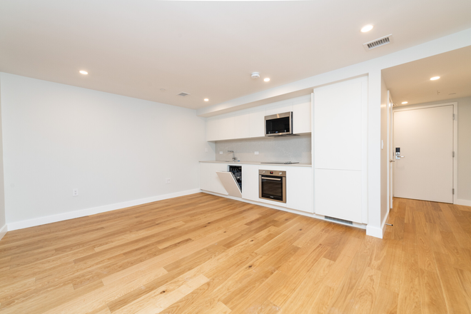 Visit hubrealtyproperties.com - North End, huge studio, newly remodeled kitchen with laundry in unit, free month rent