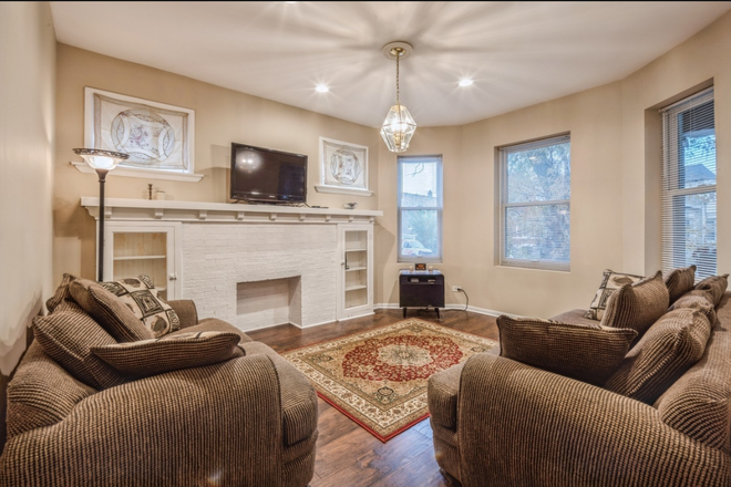 Living Room (with concept furniture-not included) - Spacious 2 BR / 1 BA Apartment Near Obama Presidential Center, Hyde Park Shops, & Stony Island Metra