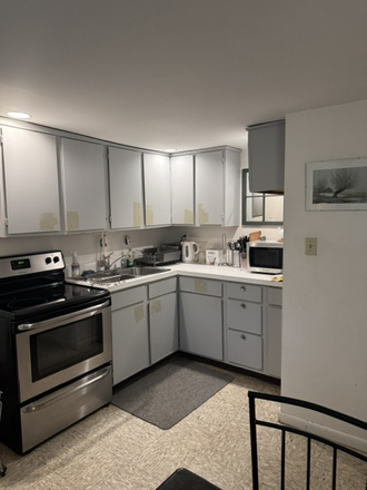 Kitchen area - 2BD Basement Apt. walking distance to Nassau and University