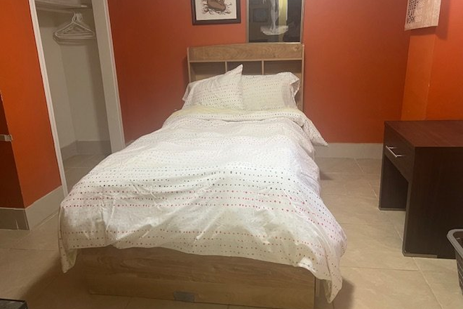Bedroom A: $830 with Single sized bed (Shared bathroom) - Private rooms for female in a shared basement at Victoria Park Avenue! Utilities included! House