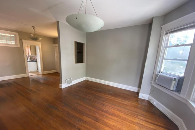 Living room - AUGUST 2026- Walk to UC campus from this studio! Apartments