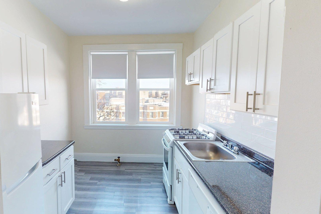 Visit hubrealtyproperties.com - Front 2 bedroom with new kitchen, dishwasher and balcony