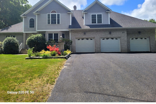 Front of house.  In-law apartment is on right - Large 2-bedroom/2 bath, In-law apartment, Country-setting, 13 minutes to UMass.  1 dog allowed.