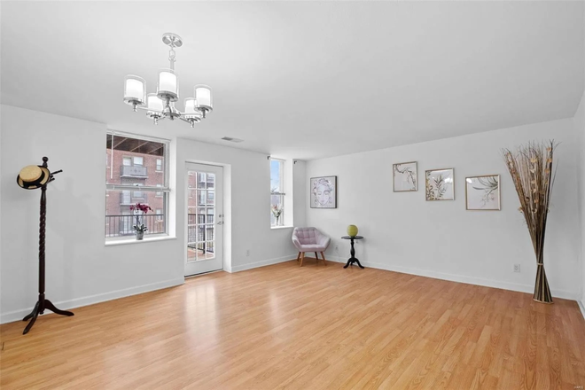 Living Room - 5696 Kingsbury Ave – Near Shuttle Stop – Gym in building – Large deck Condo