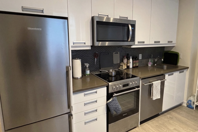 Kitchen - Furnished Master Bedroom in Luxury Downtown Toronto Condo | Pool, Gym & Laundry