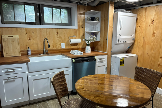 kitchennette with laundry and dishwasher - Blue Back Burrow Apartments
