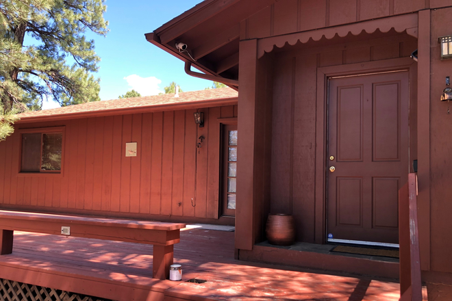 Facade - Fantastic remodeled 4 bed/3 bath home with large deck and fenced backyard a few minutes from NAU