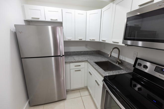 Renovated kitchen, SS appliances, granite countertop - Across from Metrorail - central A/C, impact windows, pool Condo