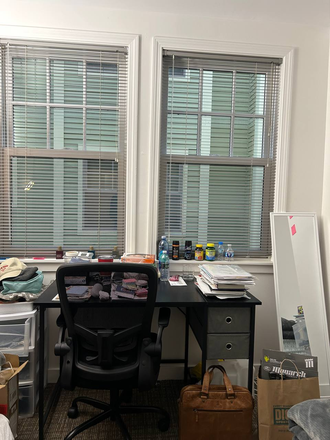 Study table with natural light from two windows - Unit 1 Apartments